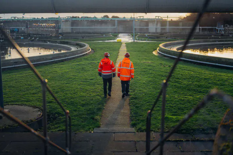Workers at a wastewater treatment plant.