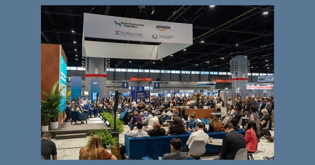 weftec Water AI Nexus presentation. Presenters on a stage speaking to a large audience at weftec.